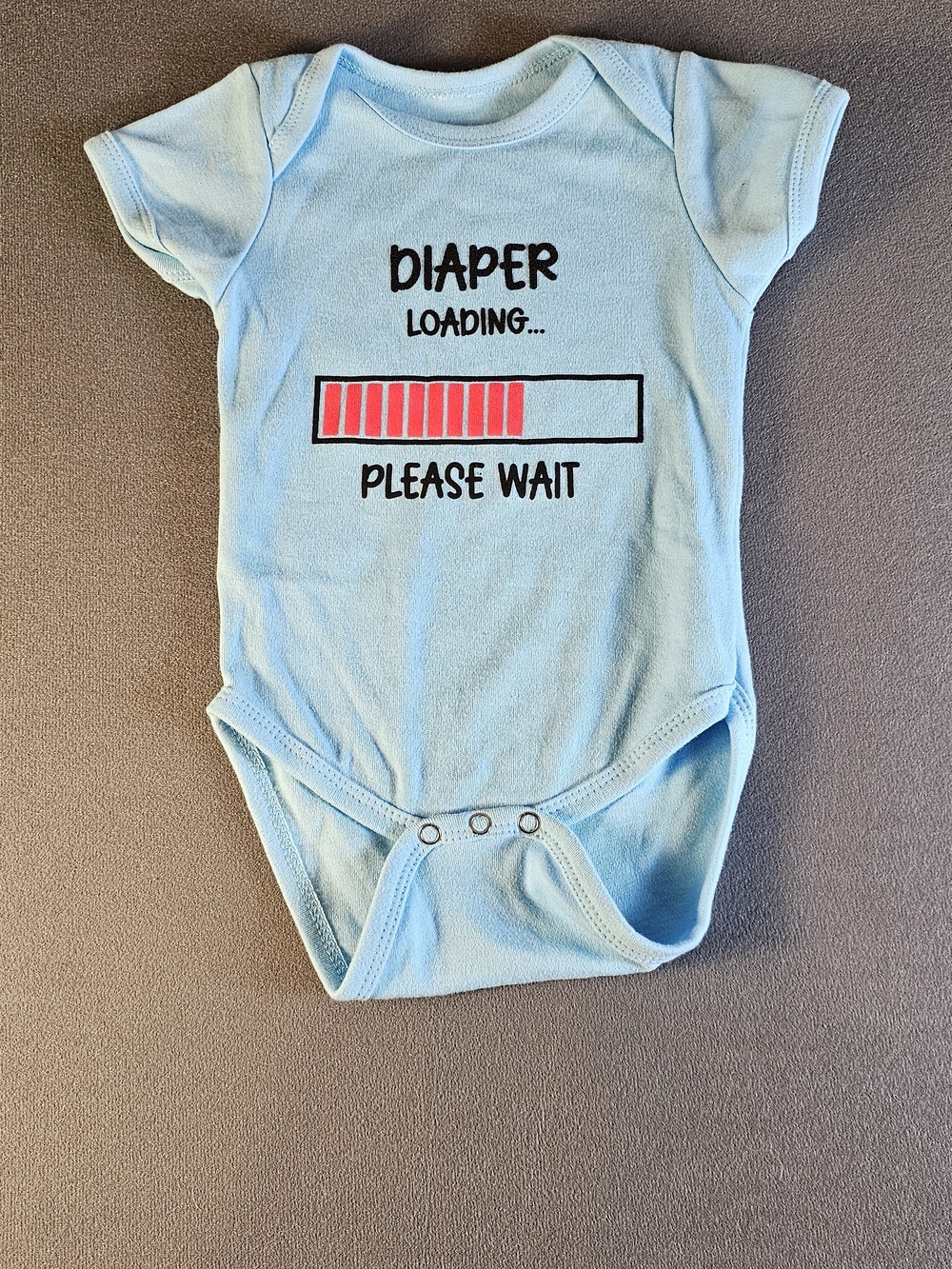 Source Unknown Light Blue Baby Bodysuit with Red Loading Graphic